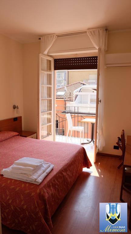 Hotel Mimosa Spotorno Bagian luar foto
