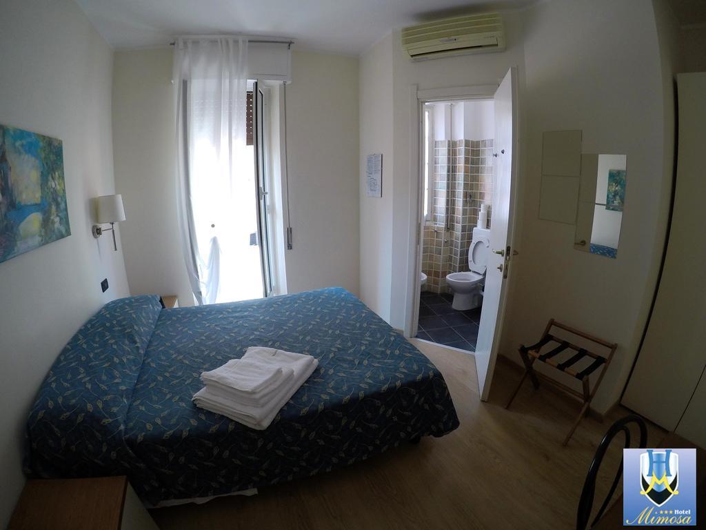 Hotel Mimosa Spotorno Bagian luar foto